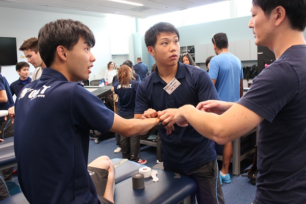 Japanese students in taping techniques workshop
