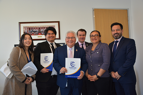 Student leaders, Dr. Fierro and board members with Bob Archuleta