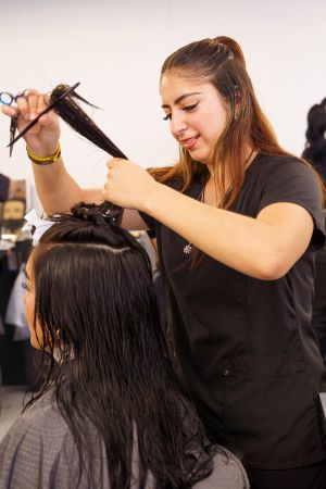 Student performing a haircut
