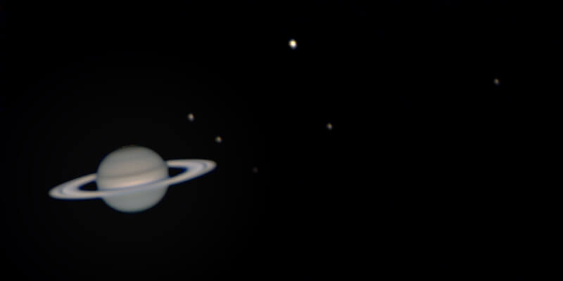 Saturn and 6 of its moons