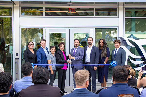 College officials cutting ribbon