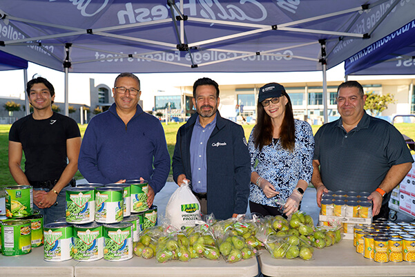 College officials and volunteers