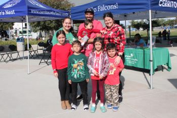 Family in holiday sweaters