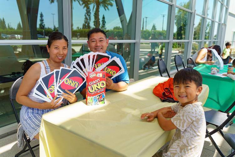 Family playing Uno