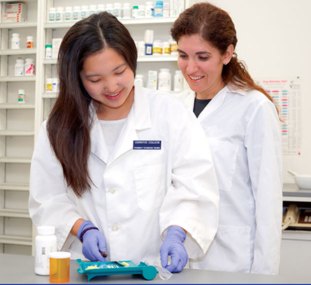 Pharmacy Technology instructor overseeing student