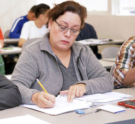 Students taking notes in class