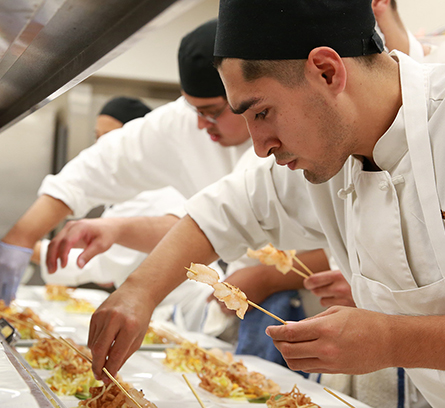 Culinary Arts students cooking in the kitchen