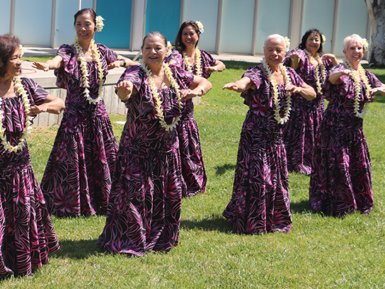 Dancers on a grassy field