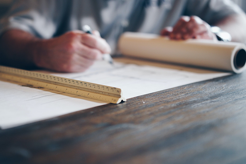 Architect person working on paper