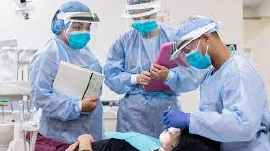 Dental team working on a patient
