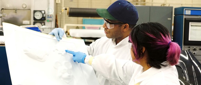 Two individuals working in applied technology & skilled trades course