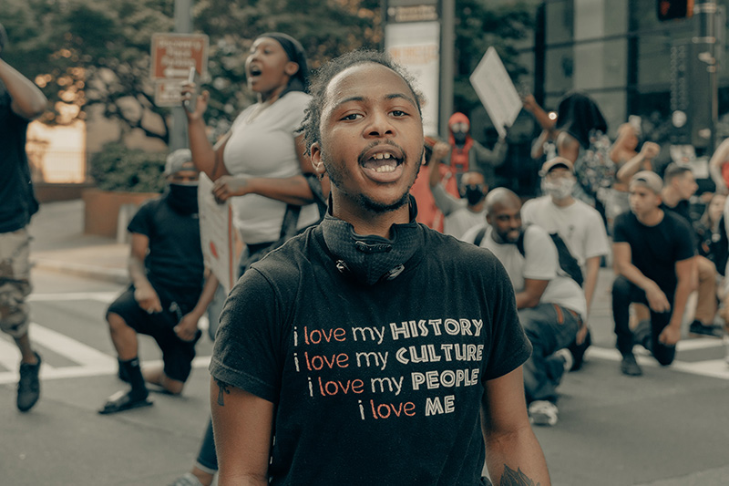 Black individual protesting