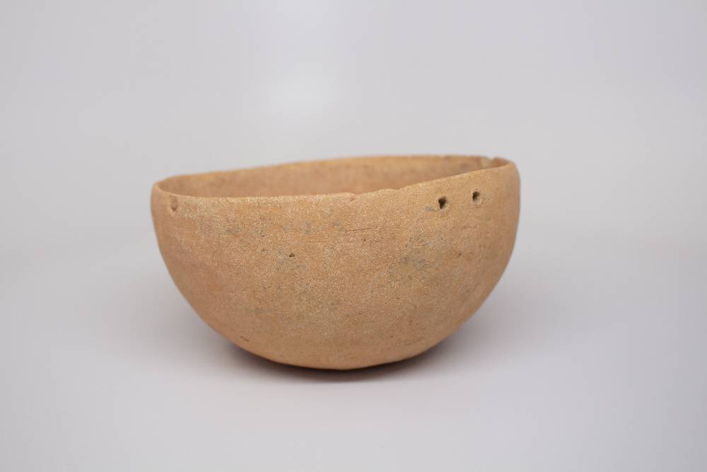 Brown ceramic bowl.
