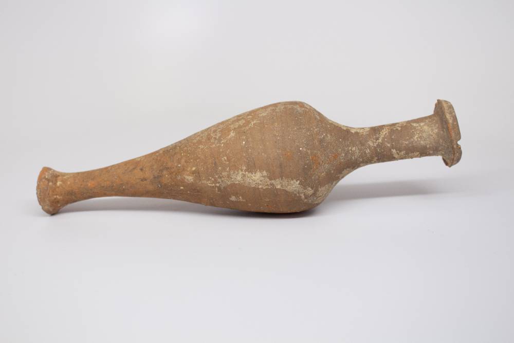 Spindle-shaped amphora with long neck and rim.