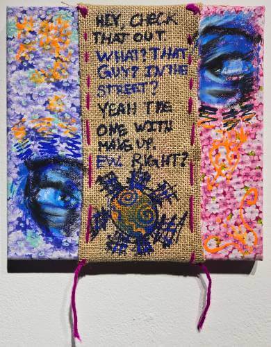 Hey check that out. What? That guy in the street? Yeah the one with makeup. Ew.