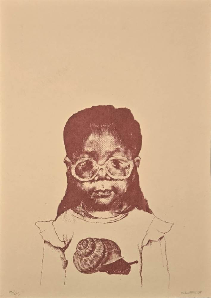 Little girl with large round glasses.