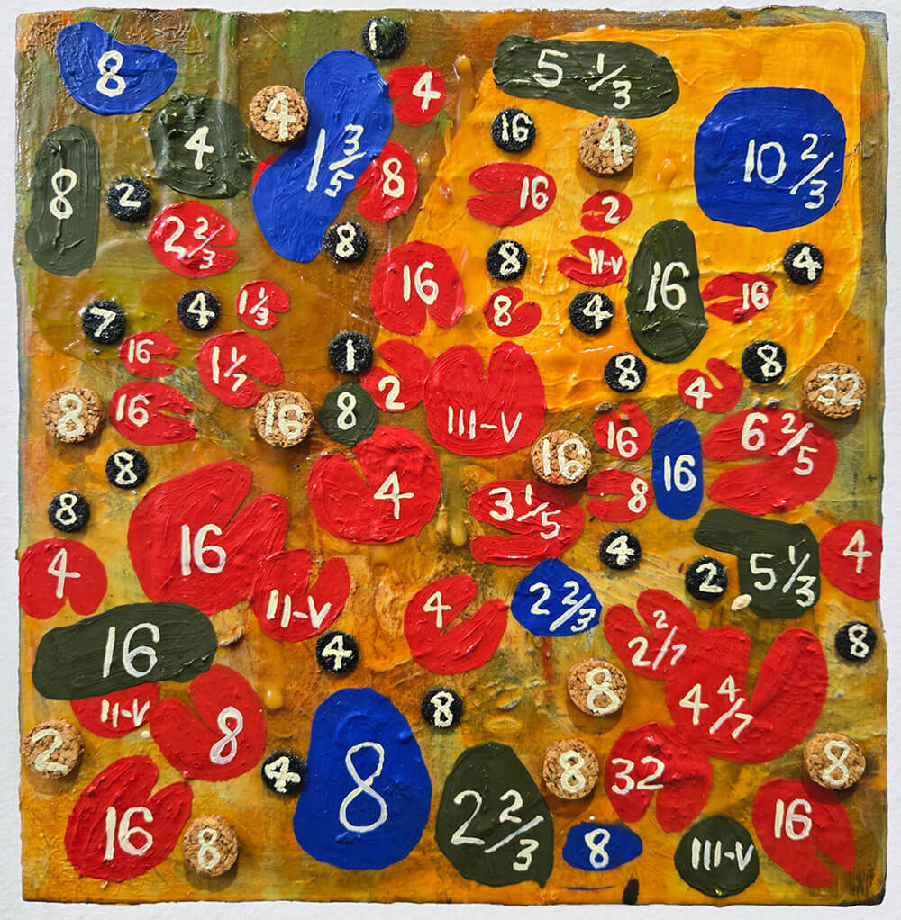 Lily pad shaped circles with numbers in white paint inside.