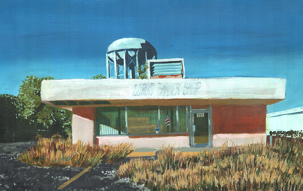 An abandoned building with overgrown grass