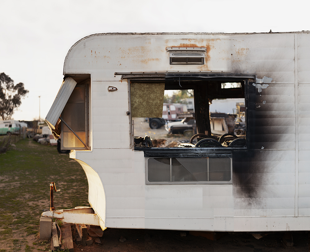 A detail of a burnt trailer home.