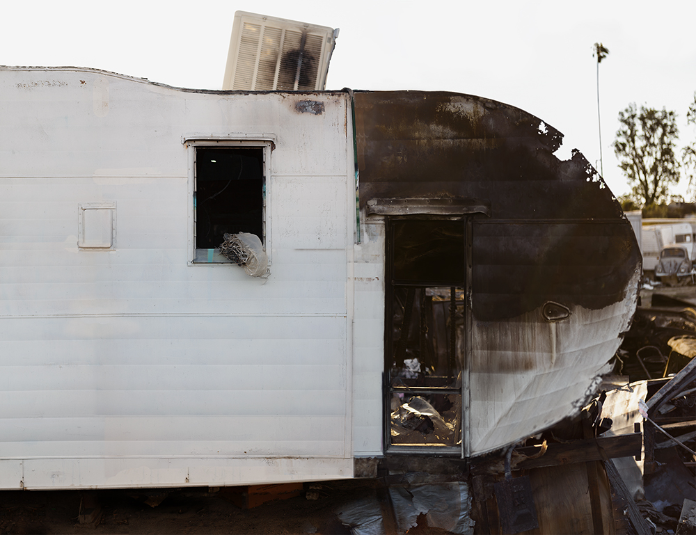 A detail of a burnt trailer home.