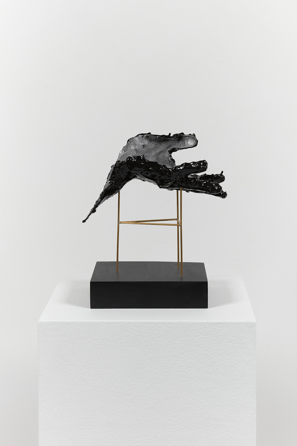 Black Hand Floating on Metal Scaffolding