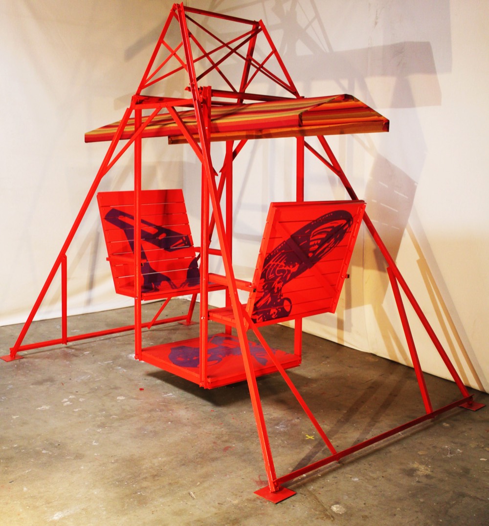 Ismael SUR 2015 Swing Set that has been painted red.