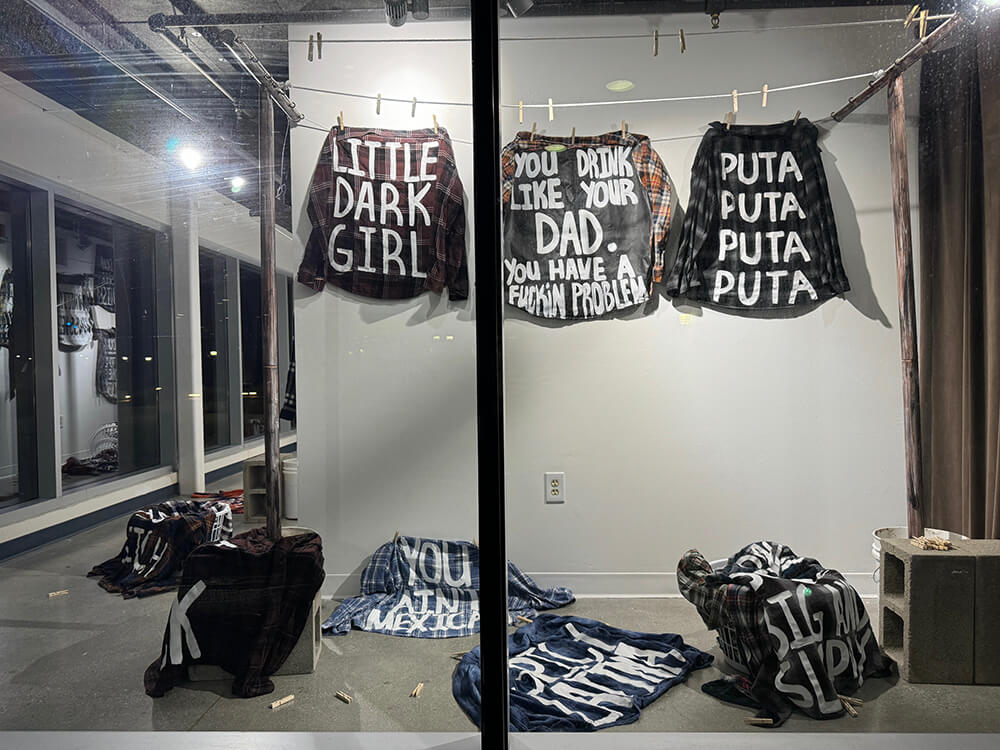 Window installation with hanging shirts