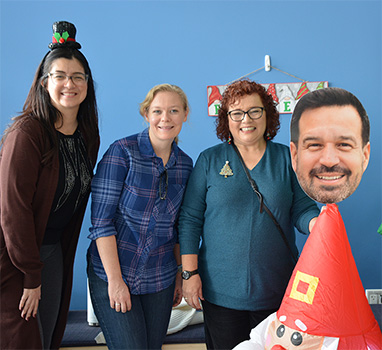 Andrea Wittig, Wendy Thomas, Toni Grijalva with a cutout of Dr. Fierro