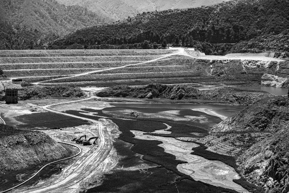 Mountainous landscape in black and white.