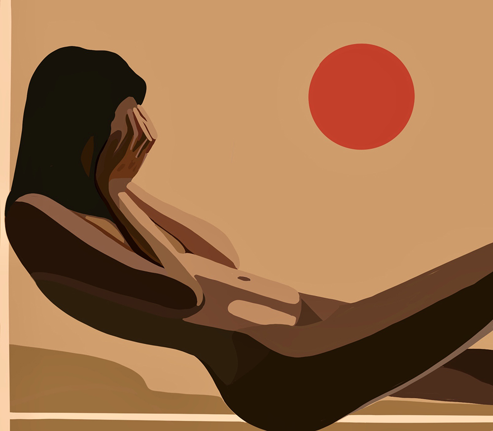 A girl laying down with her head in her hands