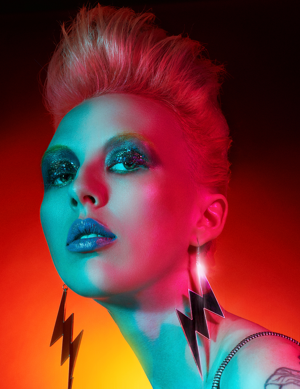 A woman in glittery makeup
