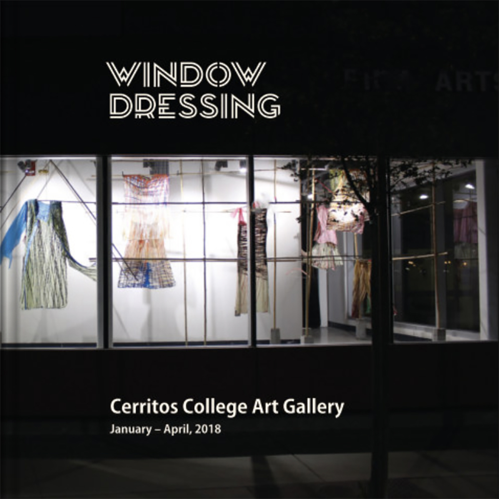 Exterior Vitrine with Clothing on Display Exterior Vitrine with Clothing on Display