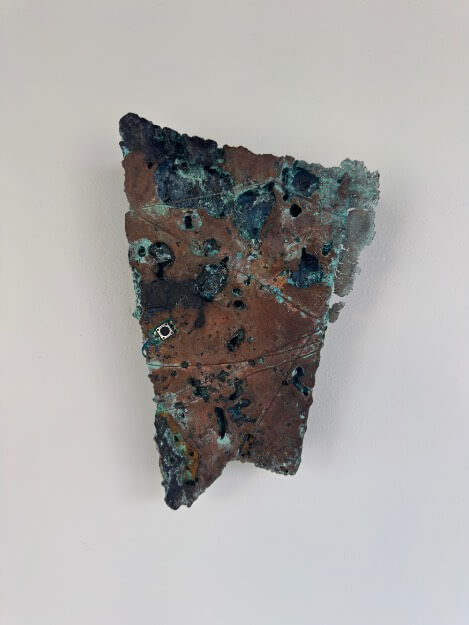 Feast Relic: 33.59269558704454,-118.0991065455975 (Platform Elly, Royal Dutch Shell Company, Huntington Beach, CA), 2024 sculpture of oxidized copper in broken triangular shape