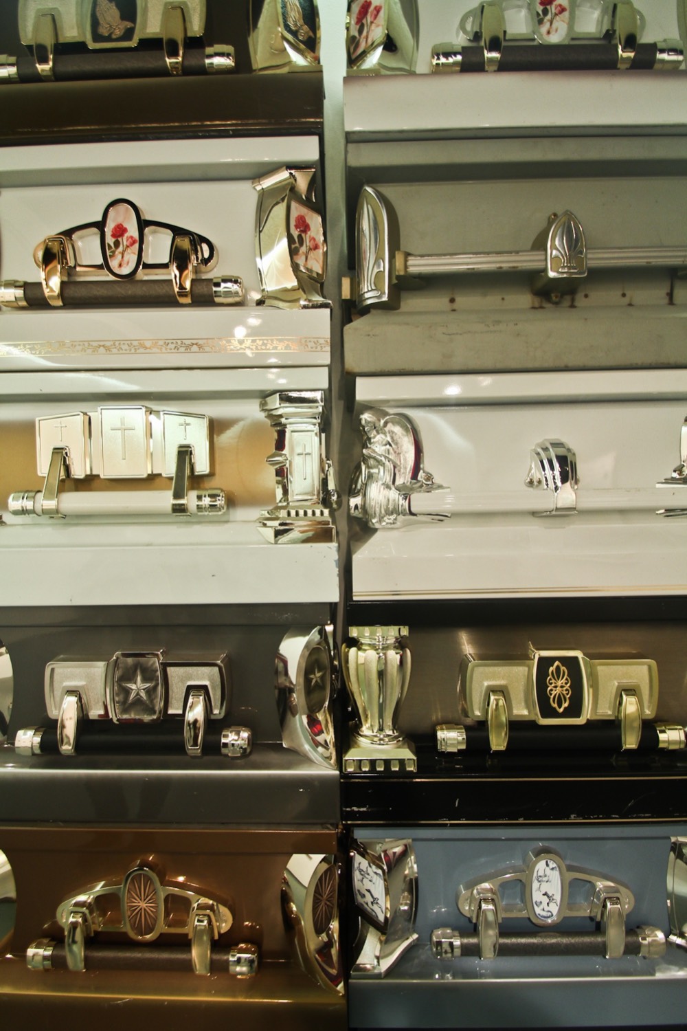 Durazo Colab SUR 2011 Stacked coffins leaning against wall.