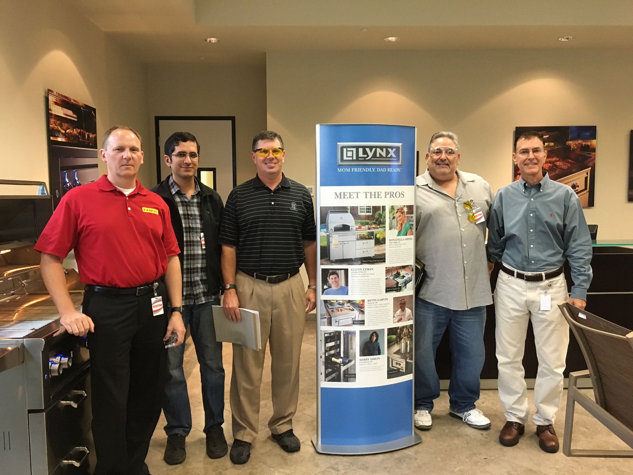A group of male participants visiting Lynx Grills company
