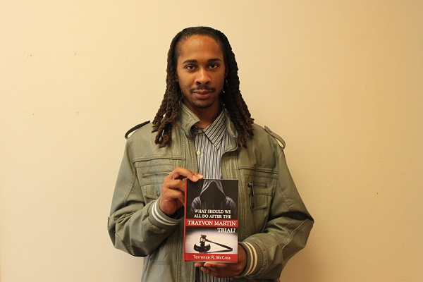 Terrence McCrea with his book