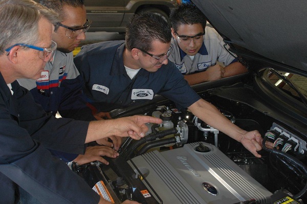 Automotive students and instructor