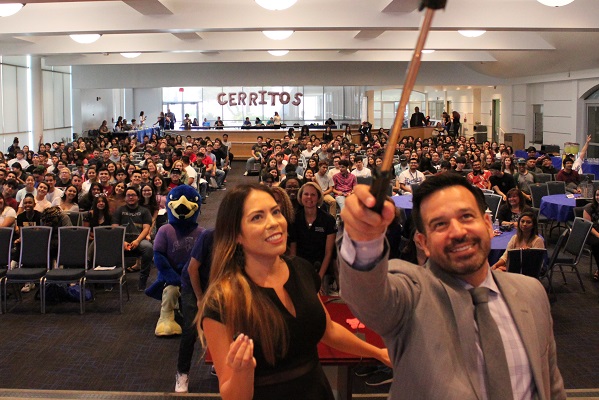 Dr. Fierro taking selfie with students