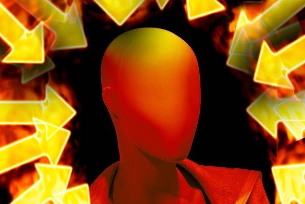 head with arrows pointing at it