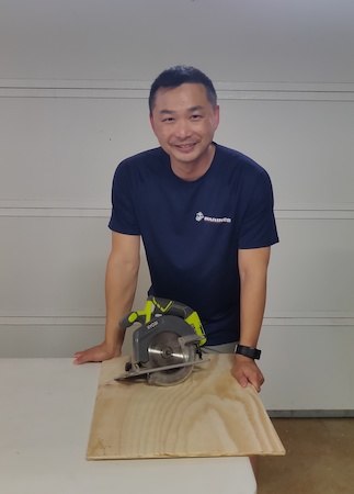 Paul Lam with a tool