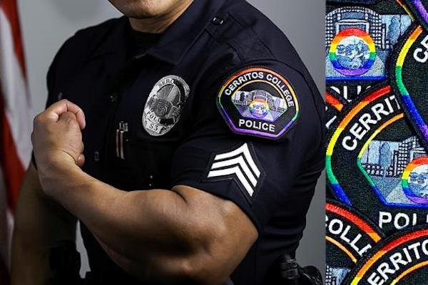 Officer showing a pride patch