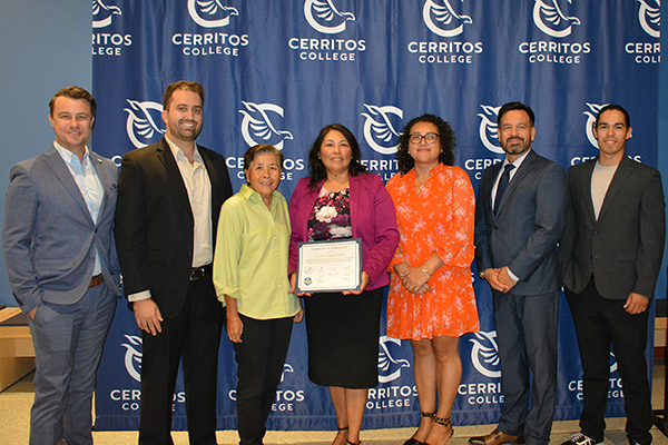 Carmen Avalos with Dr. Fierro and the Board