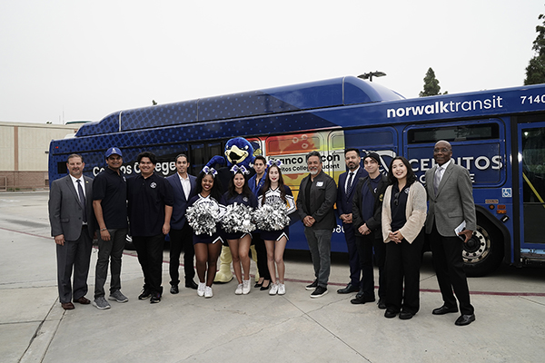 Norwalk Transit bus with college and Norwalk officials