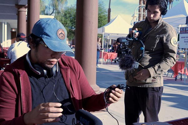 Students Jose Escobar and Roberto Hoyos volunteering