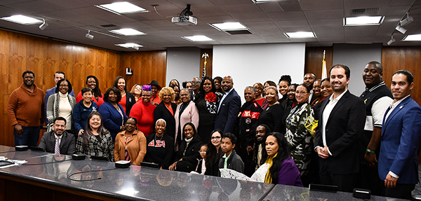 College officials, Dawn Green and her supporters