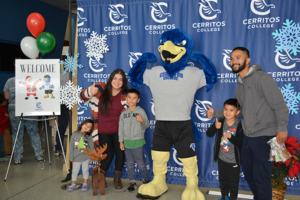 Family taking photo with Franco