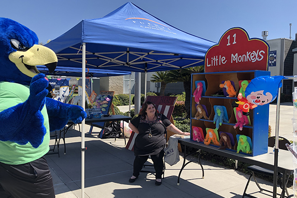 Franco Falcon playing a festival game