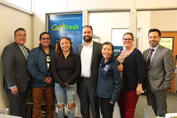 Jee Hang Lee, college officials and students at Falcon's Nest