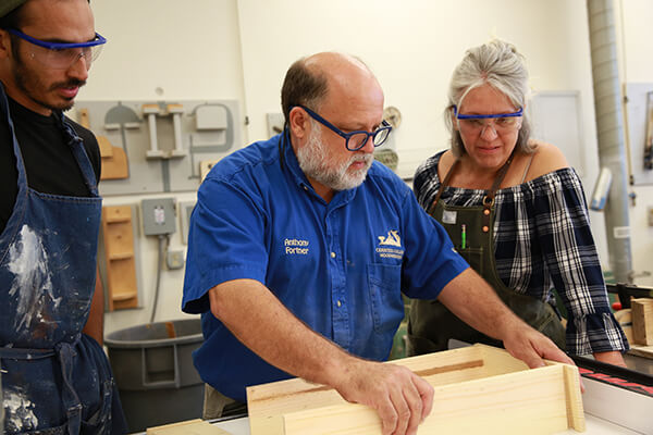 Woodworking students and instructor