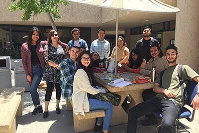 Josh (middle) with his first students